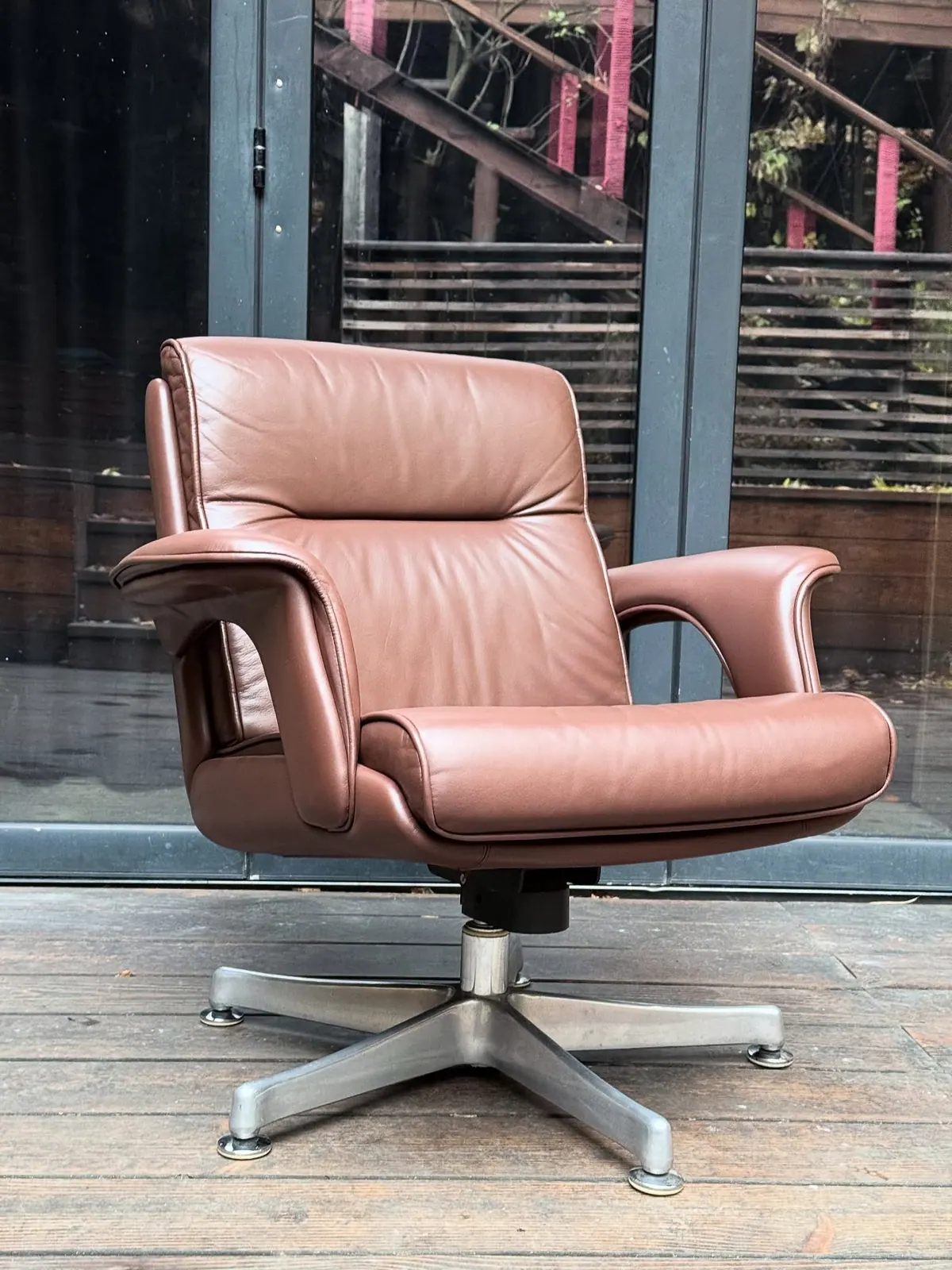 Danish swivel lounge chair, brown leather