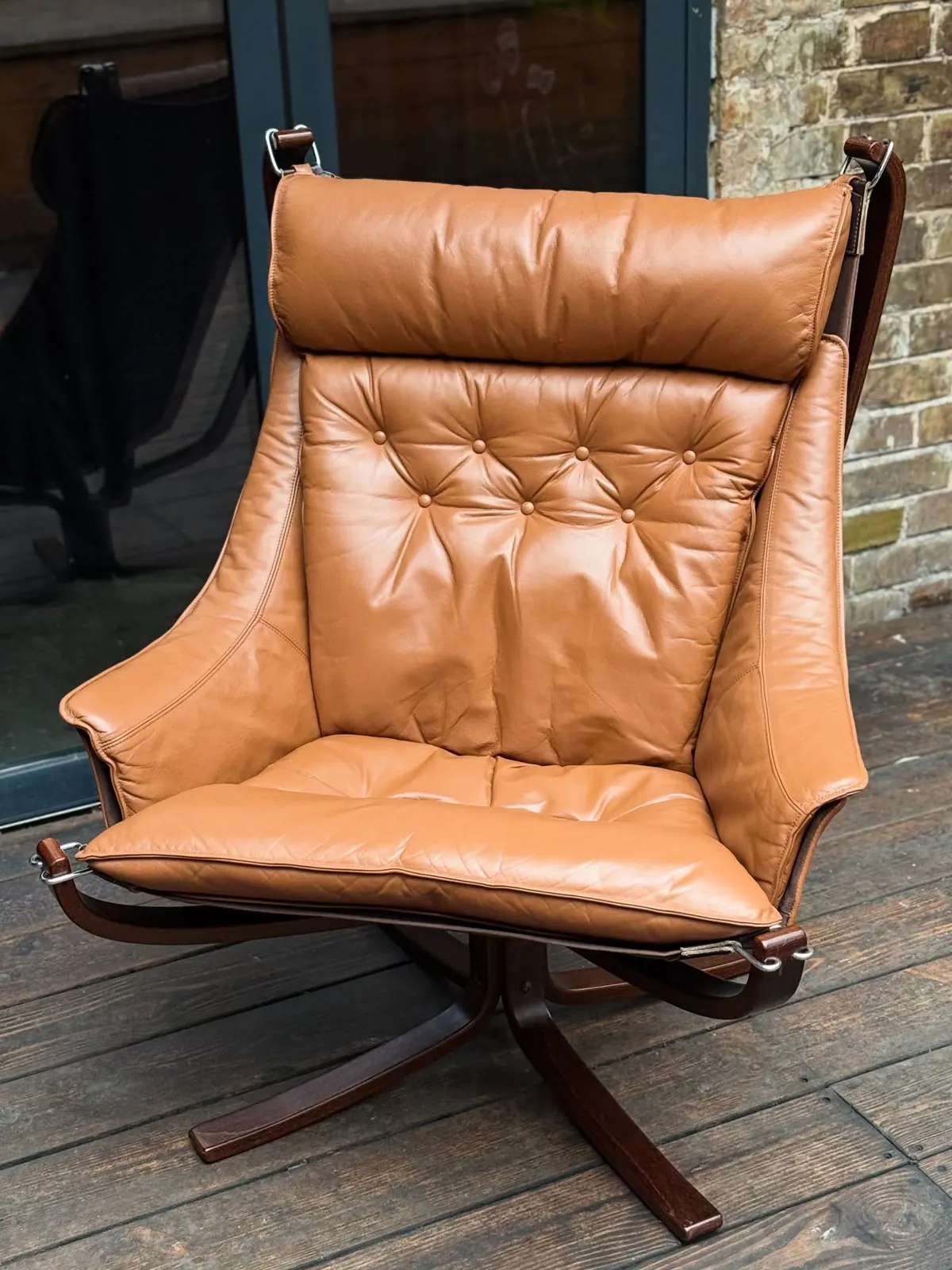 Falcon armchair, caramel leather