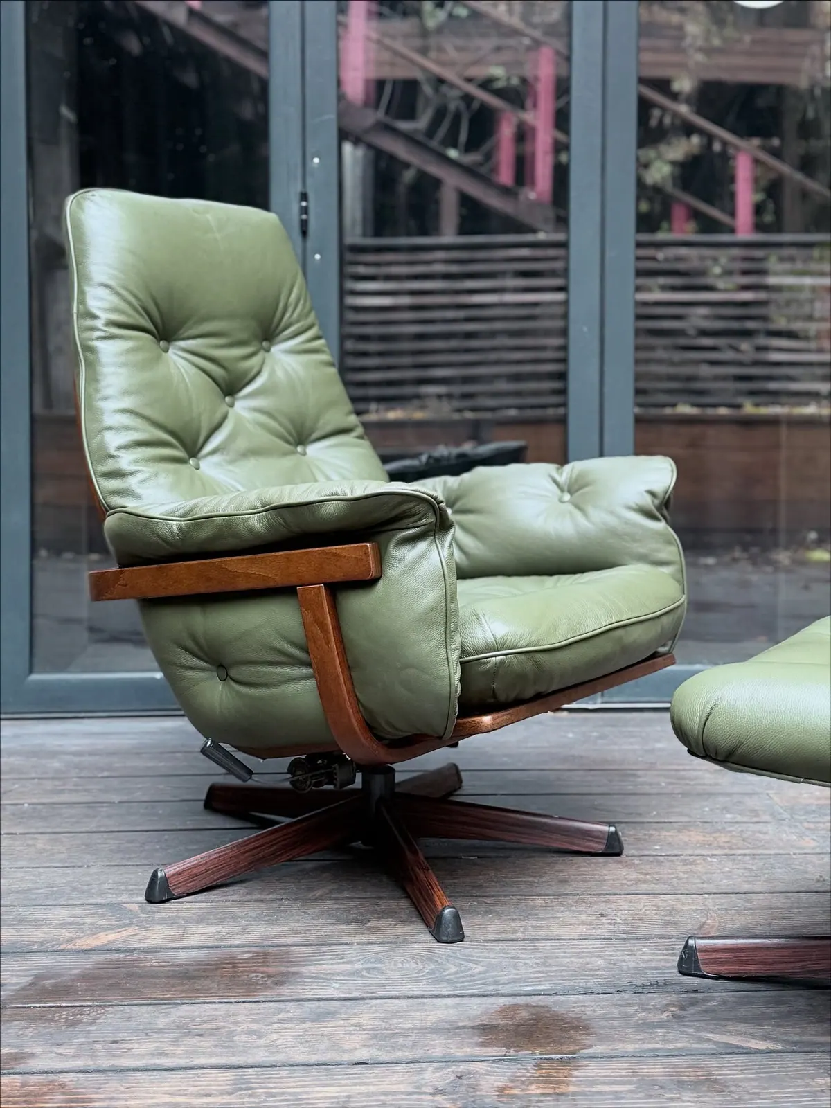 Göte Möbler armchair with pouf, olive leather