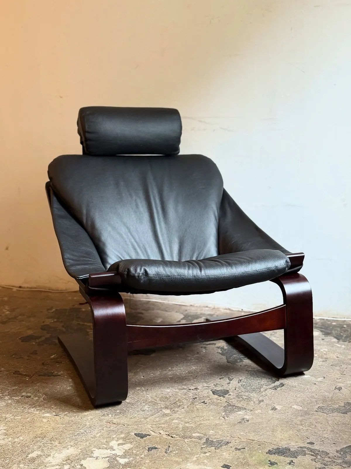Kroken lounge chair, restored dark leather